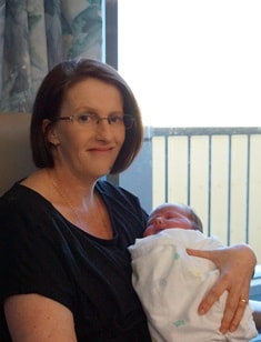 Justine Clare holds baby Amelia