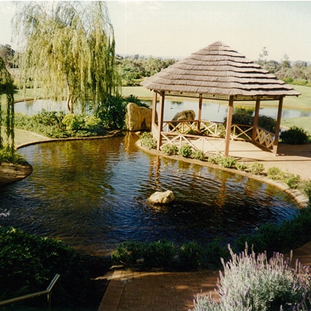 Gazebo structure beside lake in the Murdoch Hospital grounds