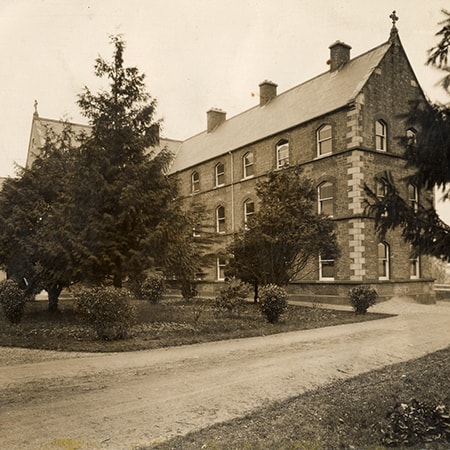 Black and white photograph of the exterior of the Sisters of St John of God Convent in Wexford, Ireland