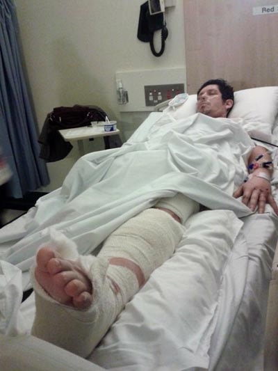 Mauricio Munoz lying unconscious in hospital