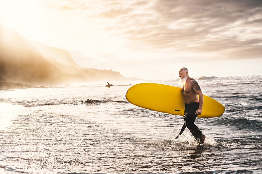 Image of man surfing with surfboard 
