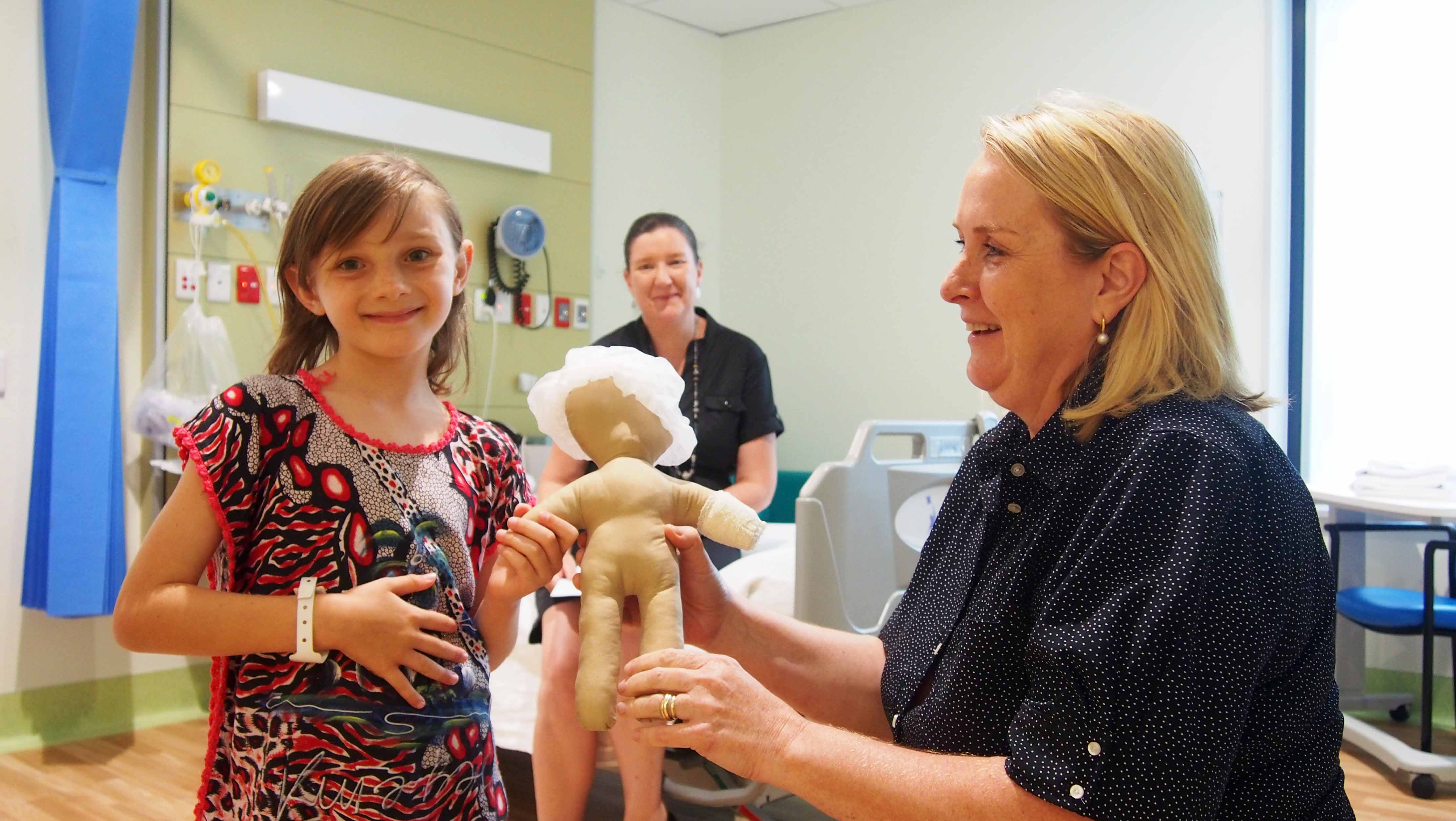 Nurse with young patient during a hospital tour
